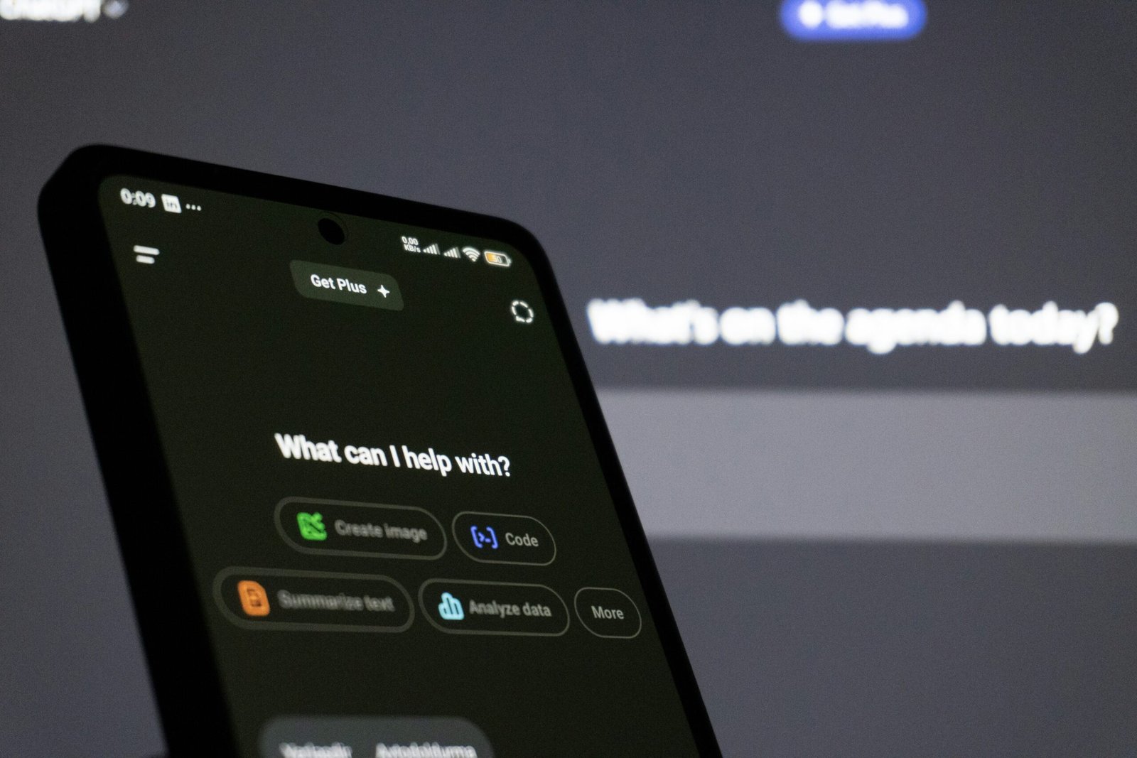 smartphone having chatgpt on screen saying what can i help you with